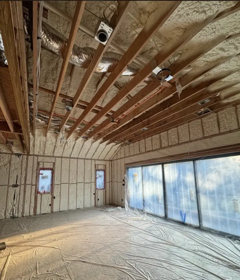 Interior walls and ceiling insulated with spray foam during new construction in Coxsackie